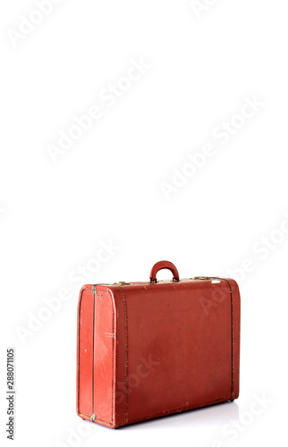 Travel leather suitcase on a white
