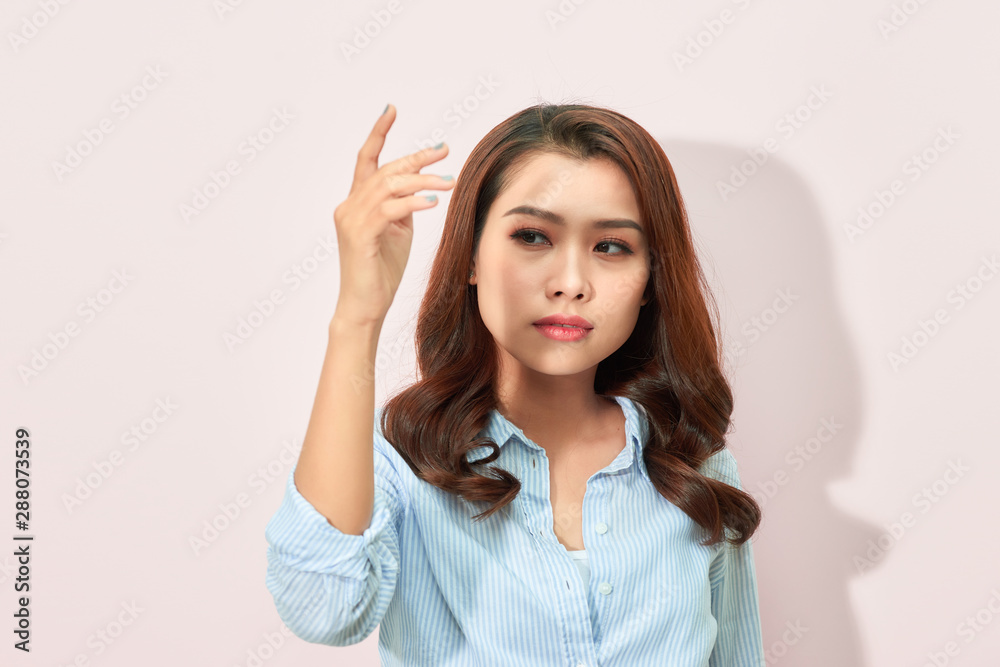 Asian woman hands covering her eyes from bright sunlight Asian woman hands covering her eyes from bright sunlight
