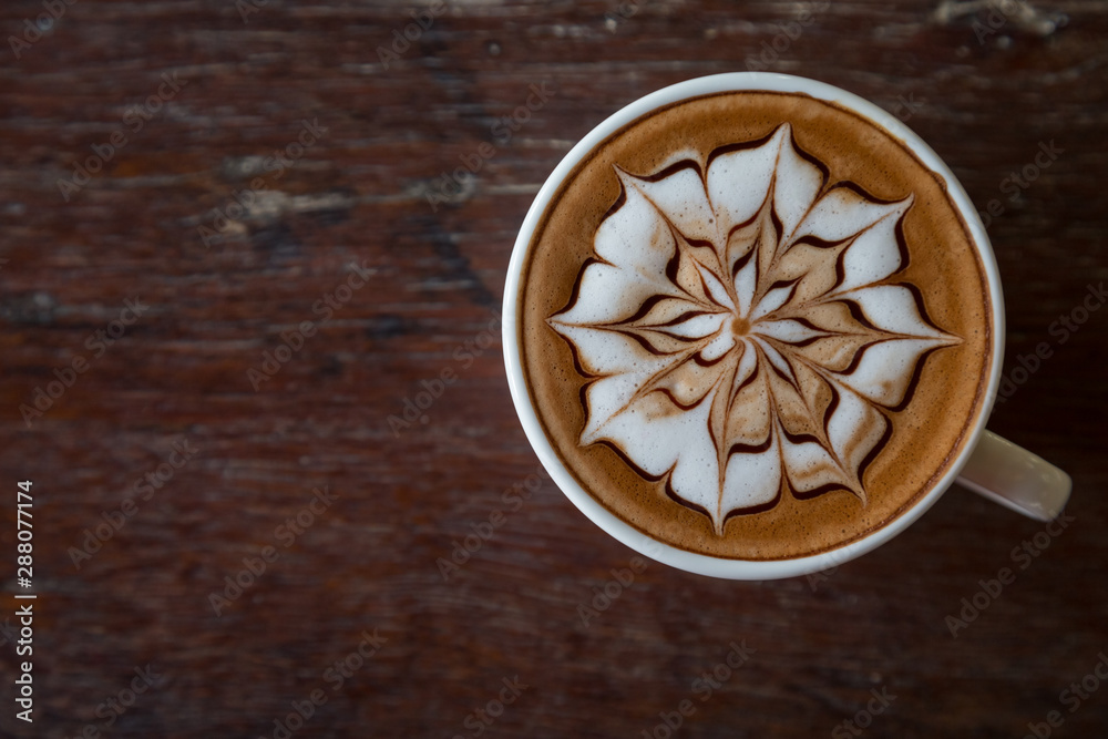 Cup of coffee with latte art on top Cup of coffee with latte art on top