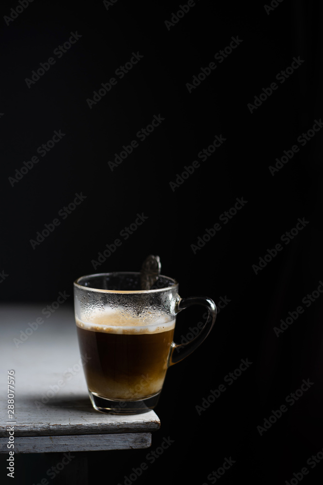Cup of coffee on white table Cup of coffee on white table