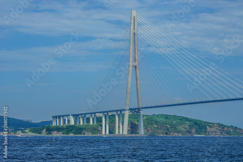 Seascape with views of the construction of the Russian bridge.