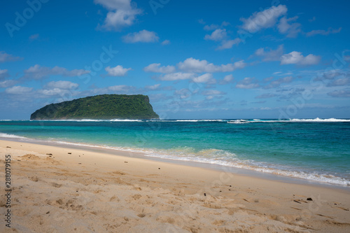 Nu'utele island in the distance on Lalomanu beach, Samoa