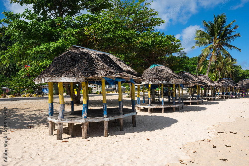 Beach fale's on a white sand beach on Lalomanu, Samoa