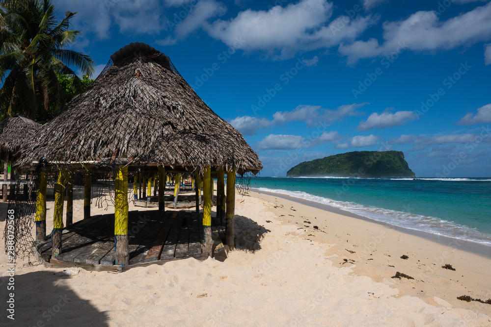 Beach fale's on a white sand beach on Lalomanu, Samoa