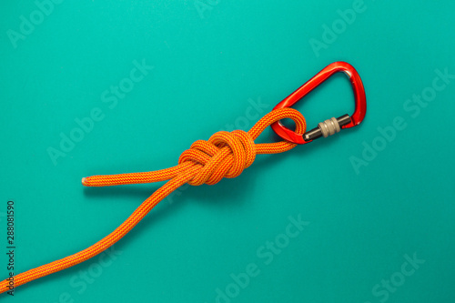Carabiner and knot from a climbing rope.
