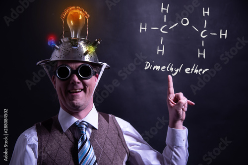 Nerd presenting handdrawn chemical formula of Dimethyl ether methoxymethane DME