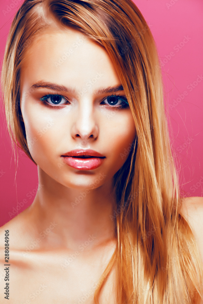 Young Pretty Blonde Real Woman With Hairstyle Close Up And Makeup On Pink  Background Smiling, Stylish Fashion Look Like Baby Doll Stock Photo,  Picture and Royalty Free Image. Image 118403725.