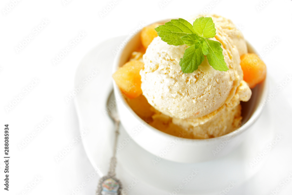 Fresh melon ice cream with melon and melissa isolated on white background Fresh melon ice cream with melon and melissa isolated on white background