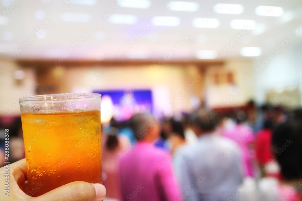 Hand holding glass to celebration on wedding or event. Object and drink concept. Hand holding glass to celebration on wedding or event. Object and drink concept.