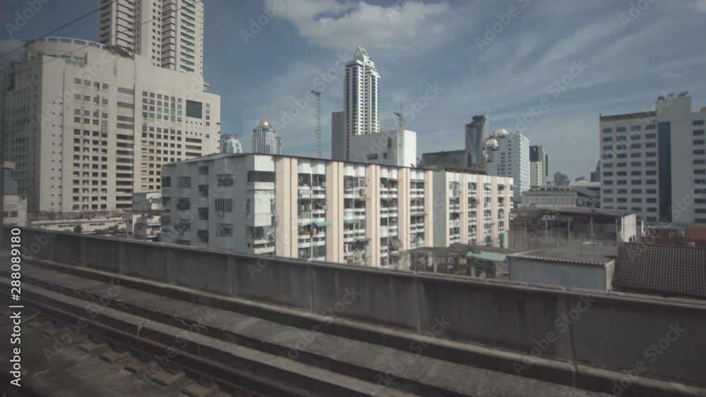 The city view out of the window of a moving train The city view out of the window of a moving train
