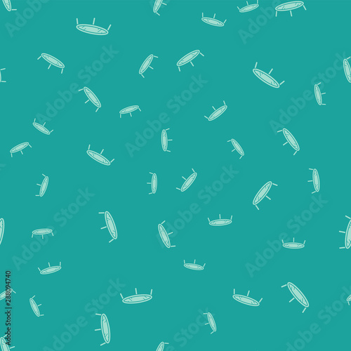 Green Jumping trampoline icon isolated seamless pattern on green background. Vector Illustration