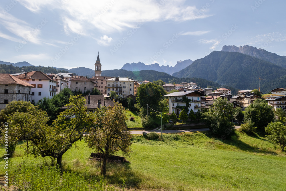 Beautiful Romantic Hight Mountain village in dolomite Alps in Italy during a sunny morning 2019