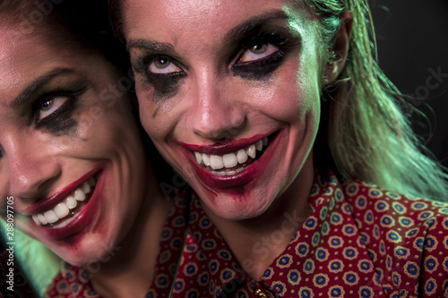 Photos Multiple mirror effect of woman with loony smile