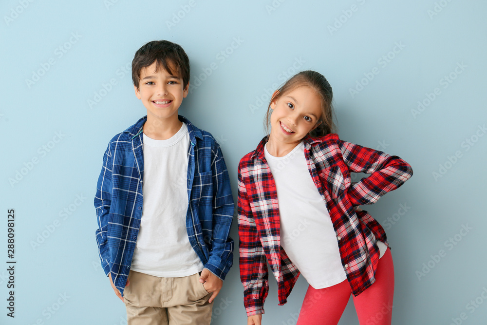 Portrait of cute children on color background - obrazy, fototapety, plakaty 
