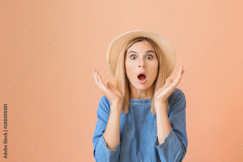Shocked beautiful woman on color background Shocked beautiful woman on color background