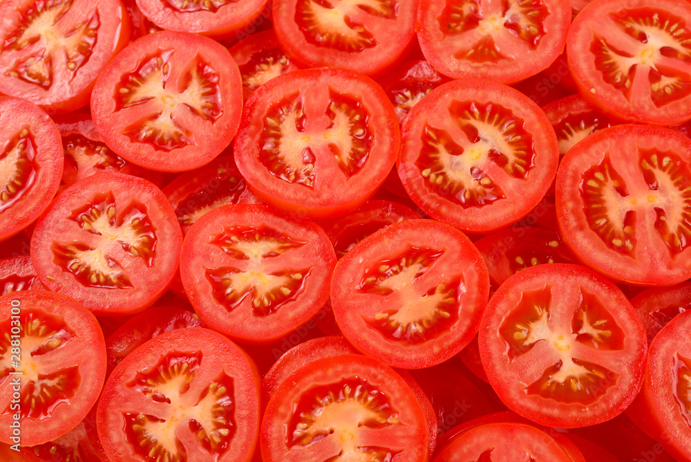 Sliced tomato background. Top view. Sliced tomato background. Top view.
