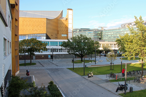 buildings (Philharmonie und Kammermusiksaal) and street in berlin (germany) photo