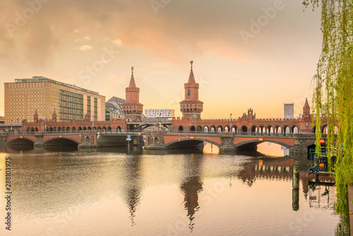 Berlin skyline with Oberbaum Bridge and Spree River, at sunrise © f11photo
