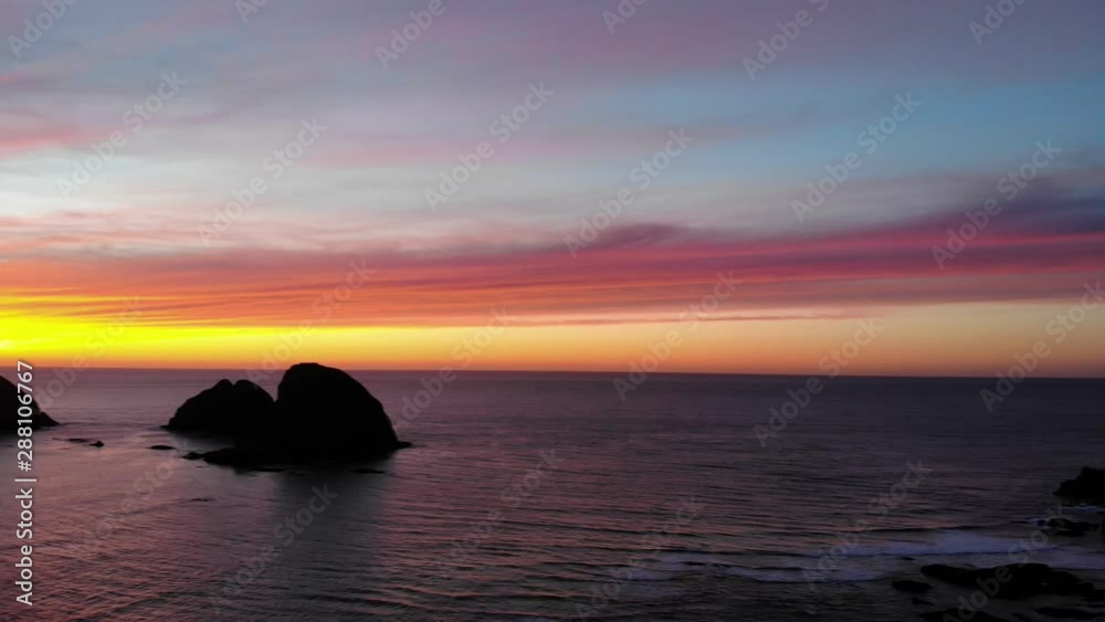 Drone flies over ocean at beautiful sunset. Drone flies over ocean at beautiful sunset.
