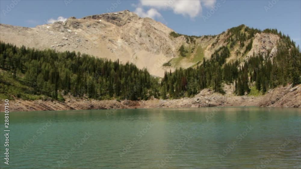 Beautiful lake and mountain shot of Sparkle Lake in Top of the World Provincial Park, Canada. Beautiful lake and mountain shot of Sparkle Lake in Top of the World Provincial Park, Canada.