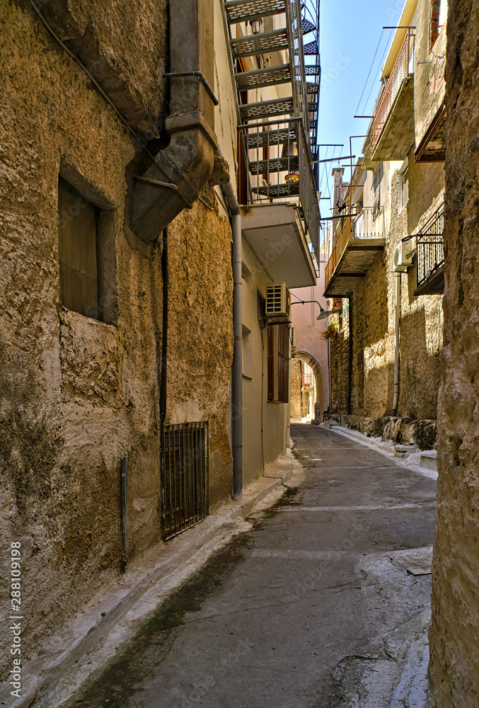 Narrow alley in Pyrgi  medieval village, Chios island, Greece.