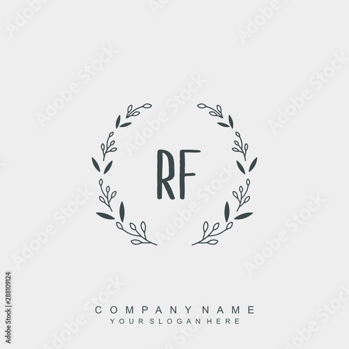 letter RF surrounded by beautiful and elegant flowers and leaves. Wedding monogram logo template.