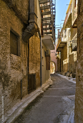 Narrow alley in Pyrgi  medieval village  Chios island  Greece.