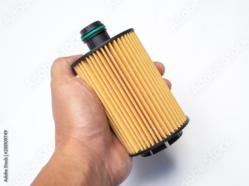 Oil filter. Car fuel filter isolated on white background photo