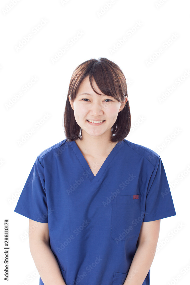 Young female nurse wearing scrub isolated on white background Young female nurse wearing scrub isolated on white background