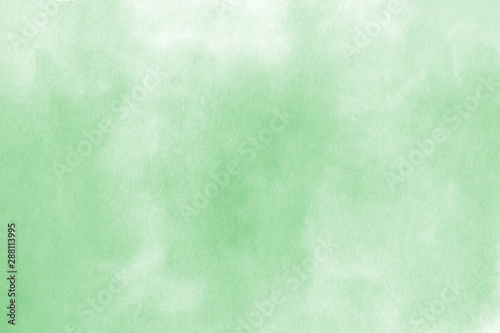 Hand drawn abstract watercolor mint background.
