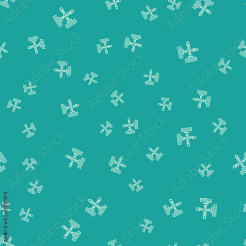 Green Crossed shaving razor icon isolated seamless pattern on green background. Vector Illustration