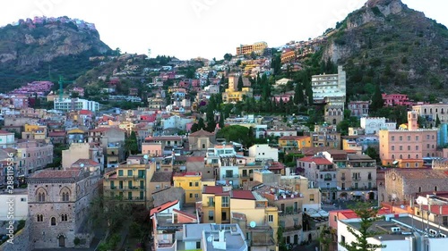 Wallpaper Mural Aerial view on buildings of Taormina, Italy. Drone shot going up, 4k Torontodigital.ca