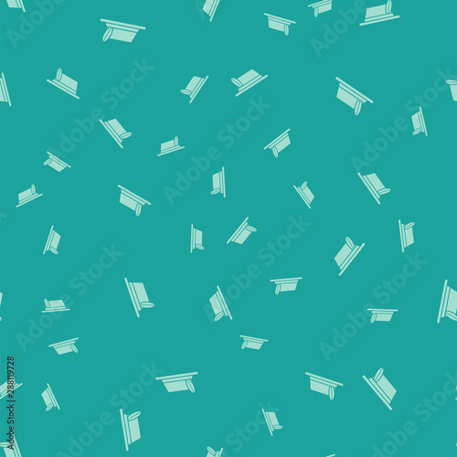 Green Oktoberfest hat icon isolated seamless pattern on green background. Hunter hat with feather. German hat. Vector Illustration