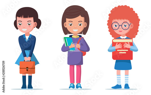 Girls are standing with a briefcase and books