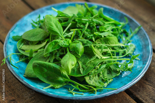 Healthy salad, leaves mix salad (mix micro greens, juicy snack). food background - copy space