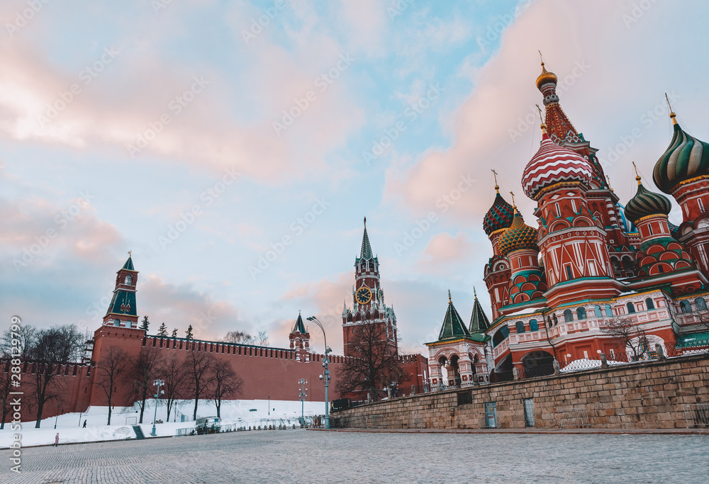 Kremlin in Moscow, St. Basil's Cathedral on red square at sunset in winter