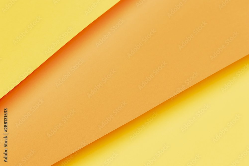 Different shades of orange papers close-up Different shades of orange papers close-up