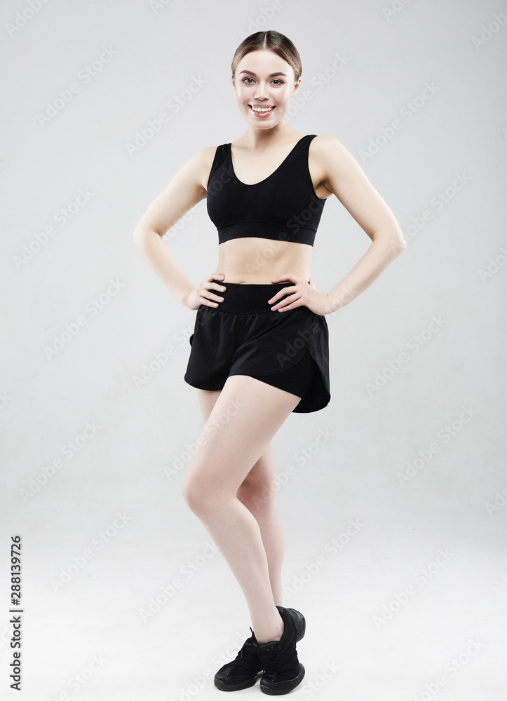 lovely young woman in sportswear posing on a white background, sport concept lovely young woman in sportswear posing on a white background, sport concept