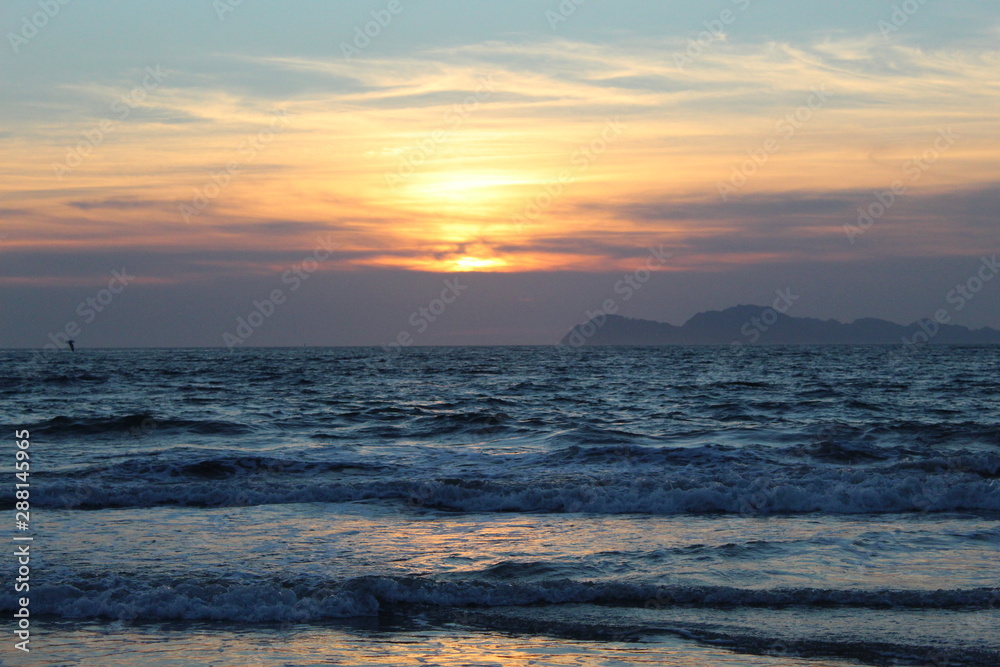 Obraz premium Sunset in Samil Beach, near Vigo city in Spain