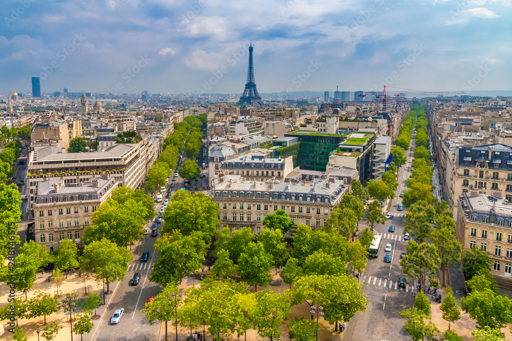 Great panoramic aerial view of the Paris cityscape with the famous and iconic Eiffel Tower in the centre, the Avenue d'Iéna on the left and the Avenue Kléber on the right.