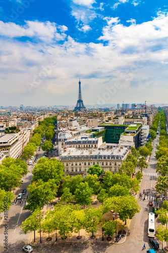 Lovely aerial portrait view of the Paris cityscape on a nice sunny day with the famous and iconic Eiffel Tower in the centre, the Avenue d'Iéna on the left and the Avenue Kléber on the right. © H-AB Photography