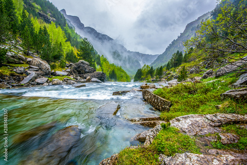 View of Ordesa valley and the mountain range above it, , Ordessa and Monte Pertdido National Park, Huesca Pyrenees, Aragon, Spain photo