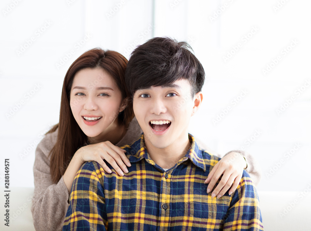 closeup Cheerful young couple in the morning at home closeup Cheerful young couple in the morning at home