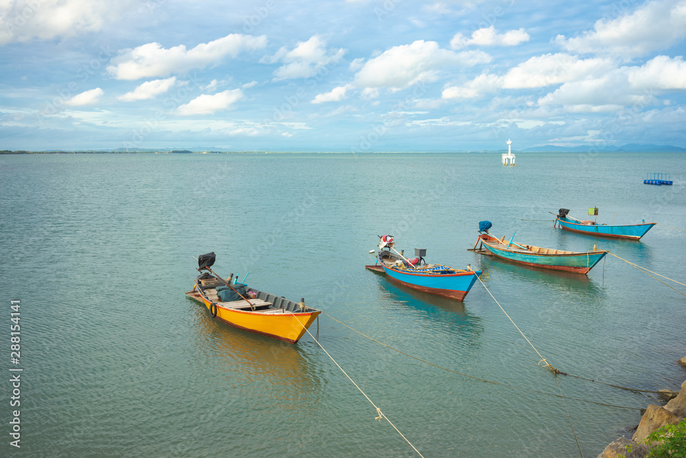 Landscape of view the fishing harbor Sunset Latinos There is a boat landing. In a fishing village in Rayong, Thailand, fishing is the main occupation of the people.