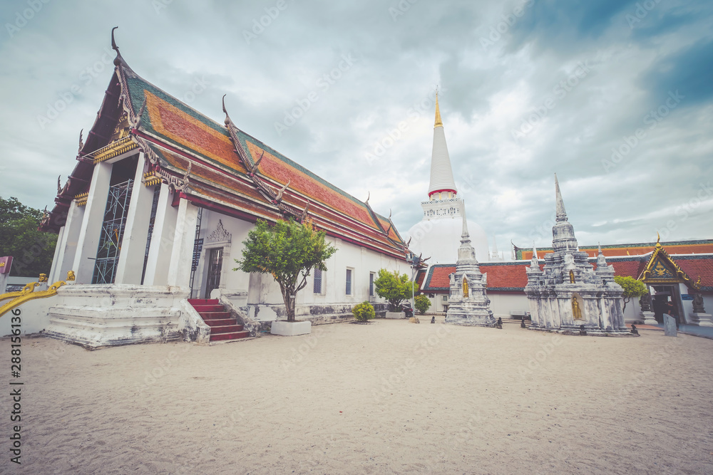 Wat Phra Mahathat Woramahawihan with cloudy sky at Nakhon Si Thammarat in Thailand.