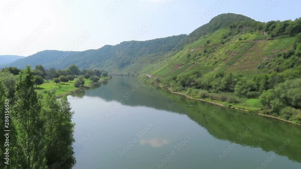 Moselle river landscape with hills and vineyards around village Bruttig. Moselle river landscape with hills and vineyards around village Bruttig.