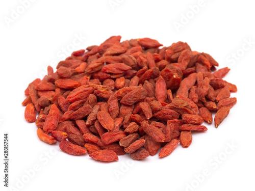 Pile of dried wolfberries isolated on white background