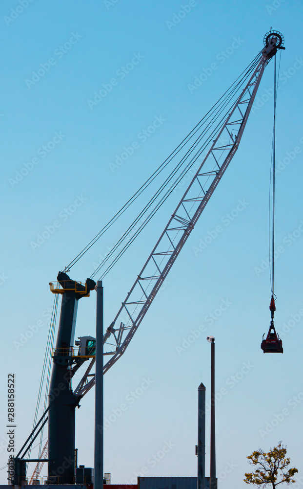 Fototapeta premium crane against blue sky