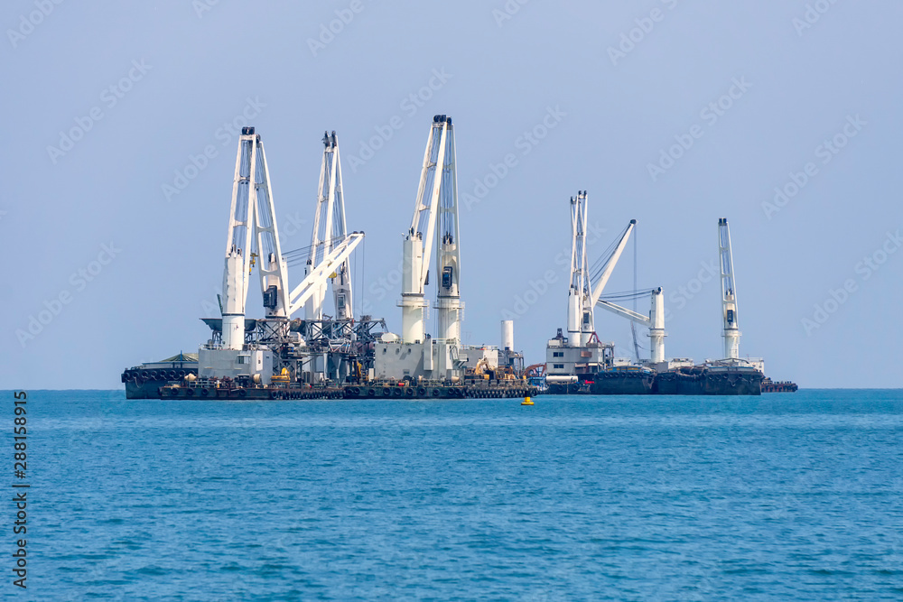 Koh Si Chang, THAILAND - MAY 20, 2019 : Large cargo ship Parked in the sea During the trip to Koh Si Chang