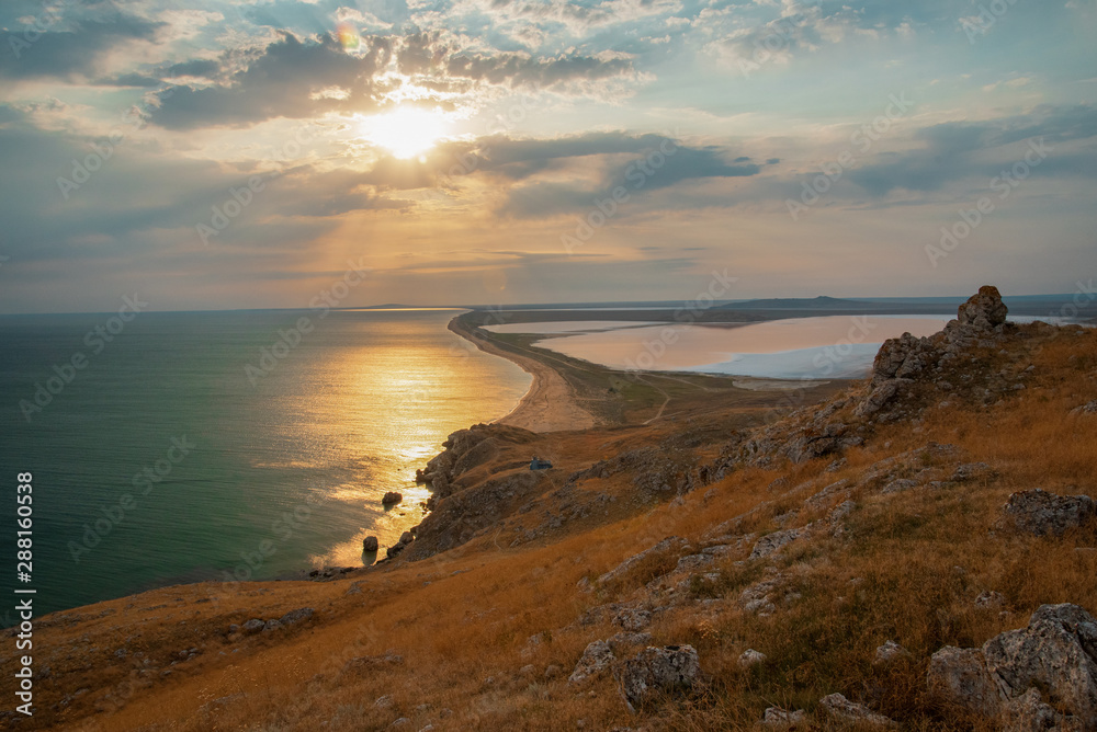 Black Sea and Kayashsky salt lake in the Opuksky reserve in the evening at sunset, Crimea